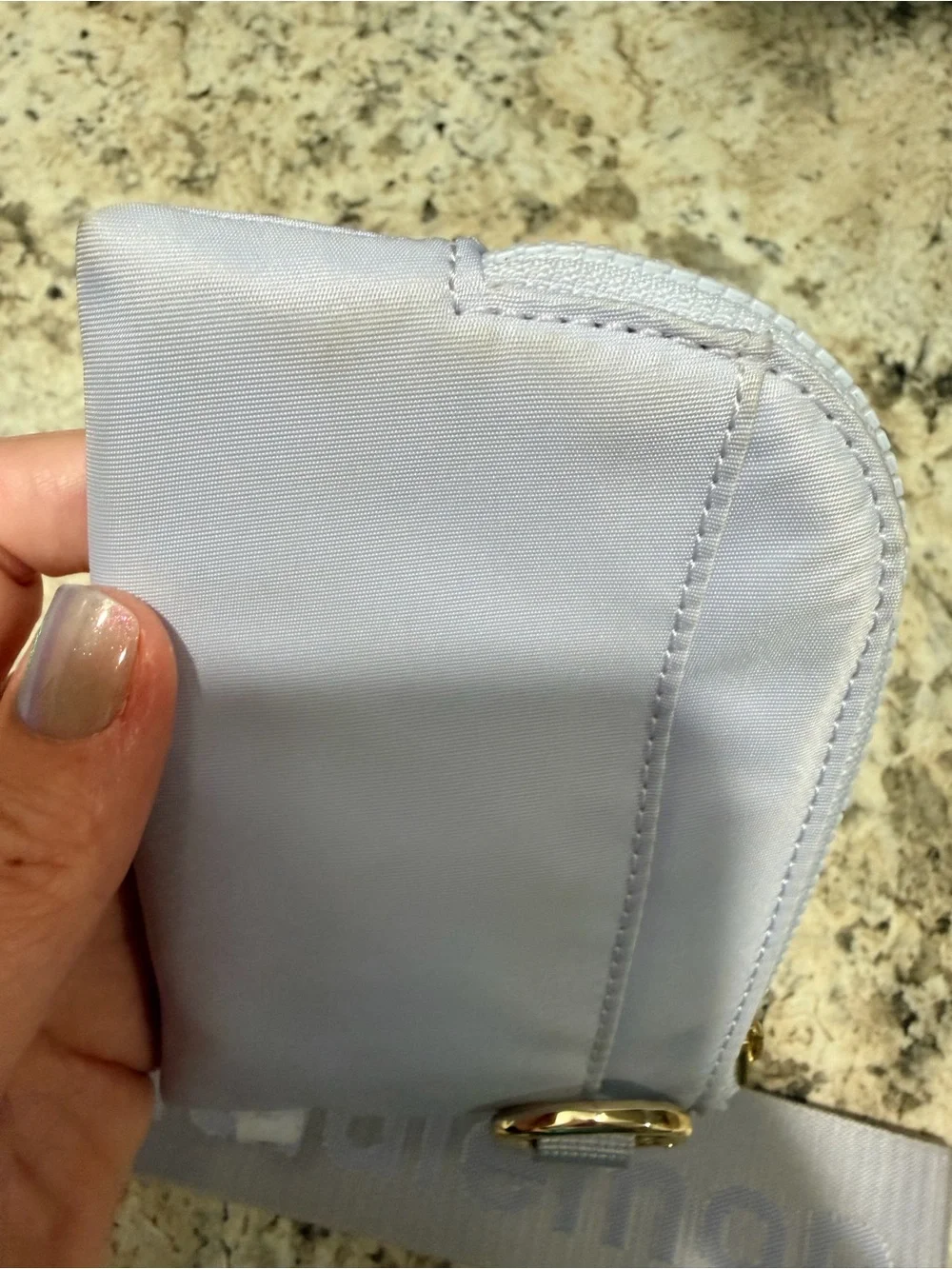 lululemon light lavender zip pouch with gold hardware